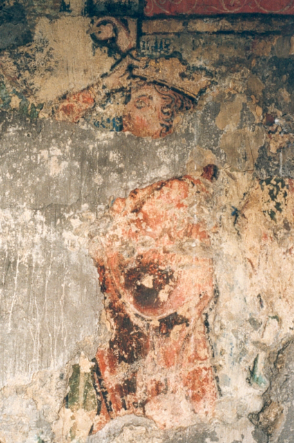 De figuur rechts van Christus.