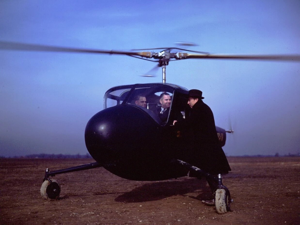 1930s: Larry Bell, Floyd Carlson, Arthur Young with Model 30 ship no.2