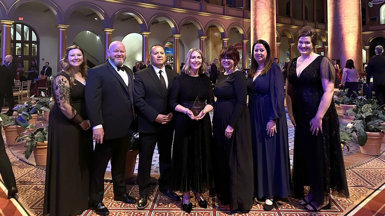 From left to right, Megan Radley, communications manager, Chris Ward and Randy Ybarra, managers of technical training, Maggie Topping, senior vice president of human resources and communications, Jen Whitfield and Michele Gifford, both directors of human resources, Courtney Lee, talent acquisition manager, accept the Aviation Week Laureate Award in Washington, D.C.