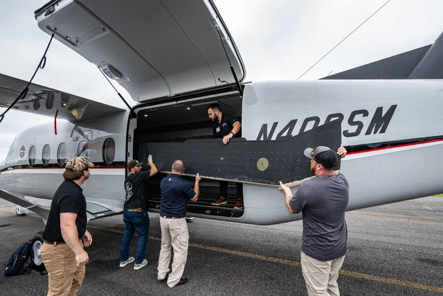 Apache helicopter blades loaded into Cessna SkyCourier 1