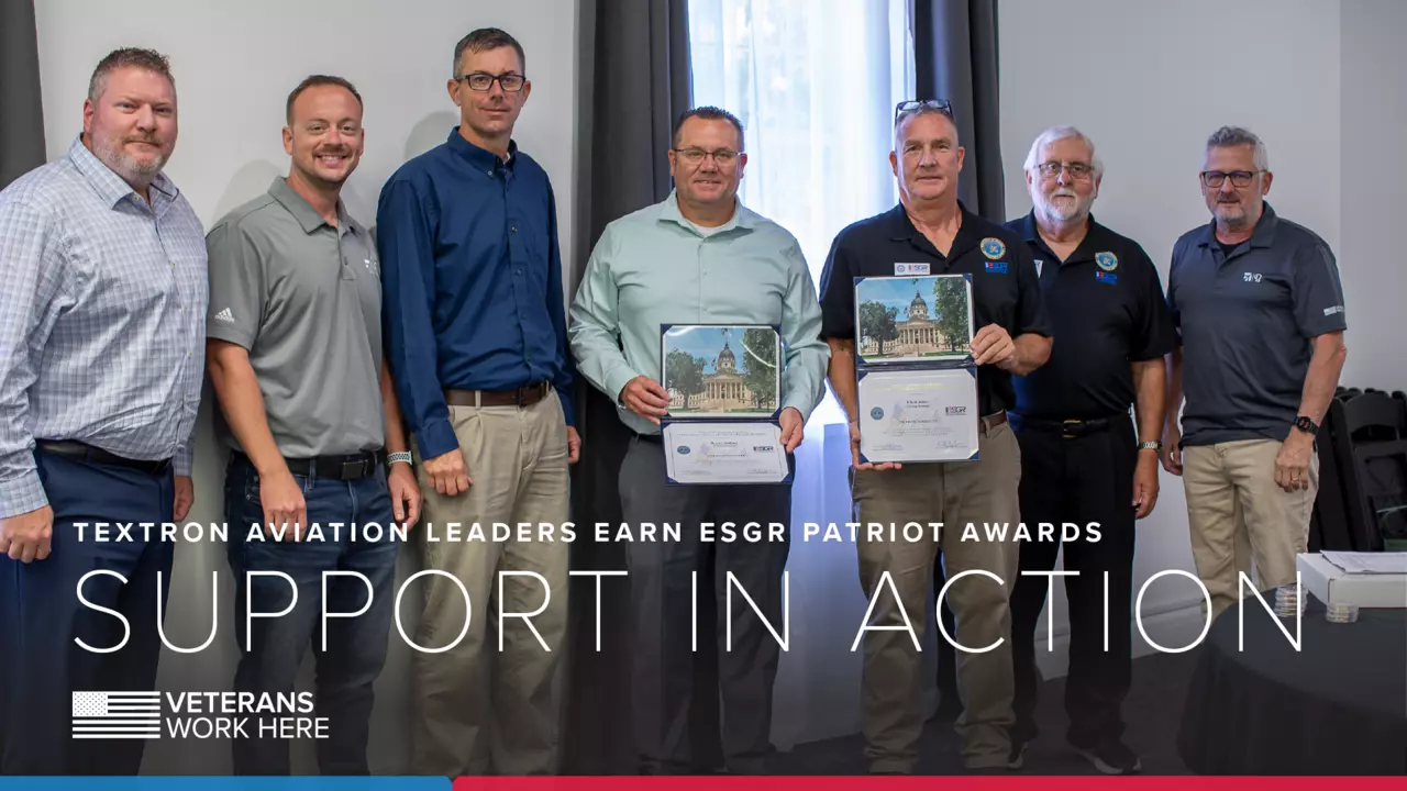 Cory Keller, Textron Aviation Quality Assurance Leader; Tyler Cluff, Textron Aviation Security Officer; Chris Jones, Textron Aviation Chief of Emergency Services; Wayne Ruffner, Textron Aviation Security Lead; Clint Moyer, Vice Chairman of ESGR; James Wishart, ESGR volunteer; John Buckley, Textron Aviation Senior Manager of Military Programs at ESGR award ceremony