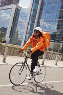 Courier_sRGB_ALL_2022_Courier2-0_Boy-Riding-Bike-Smiling_EXP-DEC2026 (1)