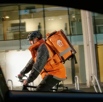 Courier_sRGB_All_2026_40-55_Male_Riding-Bike_357x351