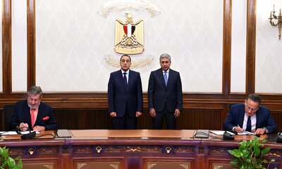Bill E Henieke and Hussam Al Shaer Agreement Signing 2.JPG