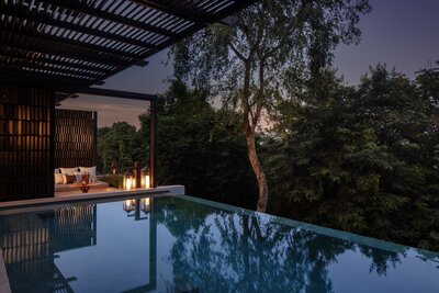 Anantara Golden Triangle Elephant Camp & Resort_Mekong Explorer Family Suite Pool Dusk.jpg