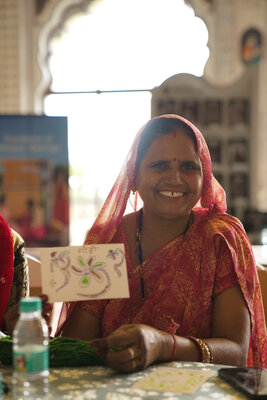Artisan Godi Ji Showing Her Signature as Part of Pehchaan Her Identity Workshop for International Women's Day 2026.jpg