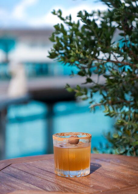 Chai on the Rocks, specialty cocktail using sea-aged Planteray Rum at NH Collection Maldives Reethi Resort.jpg
