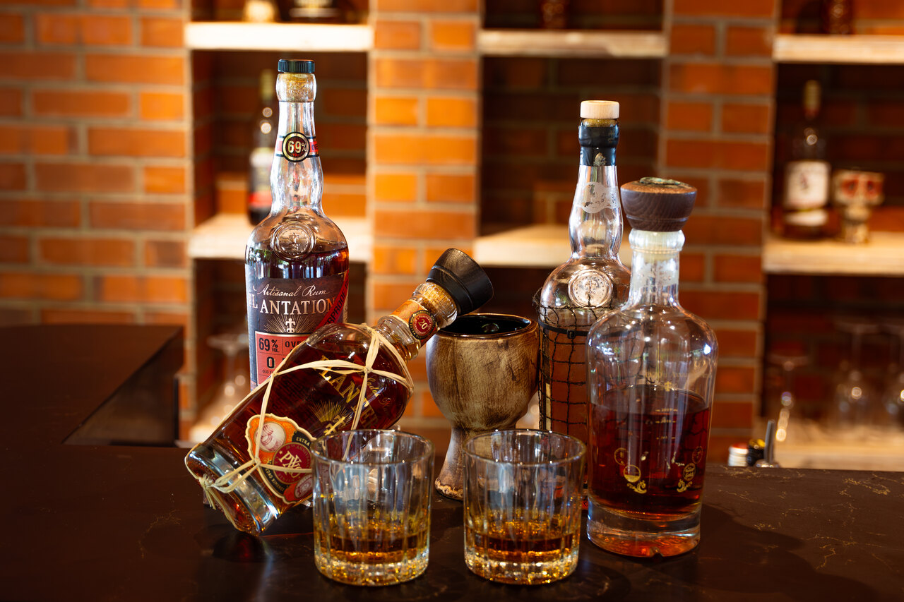 Bottles of Planteray Rum Before (Left) and After (Right) Undersea Ageing at NH Collection Maldives Reethi Resort.jpg