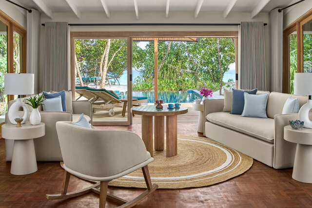 Living Area of the Two-Bedroom Reethi Suite at NH Collection Maldives Reethi Resort.jpg