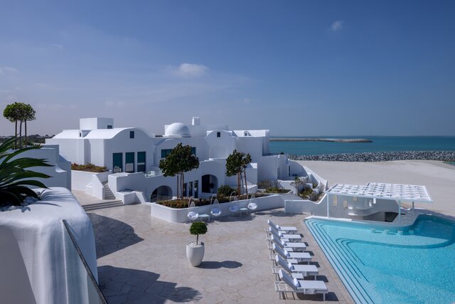 Anantara Retreat Santorini Abu Dhabi - Exterior Pool Beach View.jpg