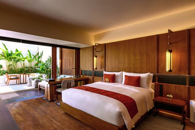 Anantara Chiang Mai Resort_Guest Room Lanna Garden Terrace Suite Bed with Garden View.jpg