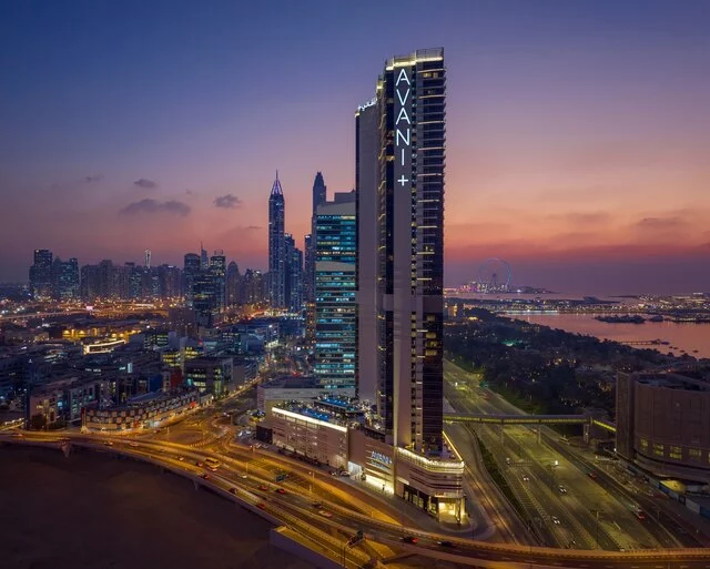 Avani_Plus_Palm_View_Dubai_Hotel_and_Suites_Exterior_View_Aerial_City_and_Sea_View_Sunset_Dubai