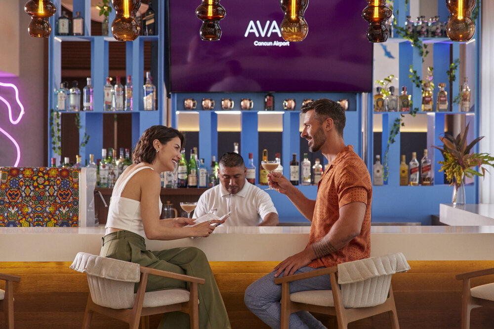 Avani_Cancun_Airport_Hotel_Lifestyle_Bar_Couple_Enjoying.jpg