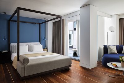 NH_Collection_Ibiza_Room_Junior_Suite_Terrace_Bed_Curtains_Open_Natural_Light