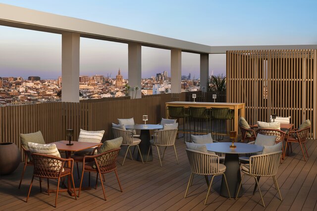 NH_Valencia_Center_Detail_Rooftop_Sunset_Views_Tables_Chairs.jpg