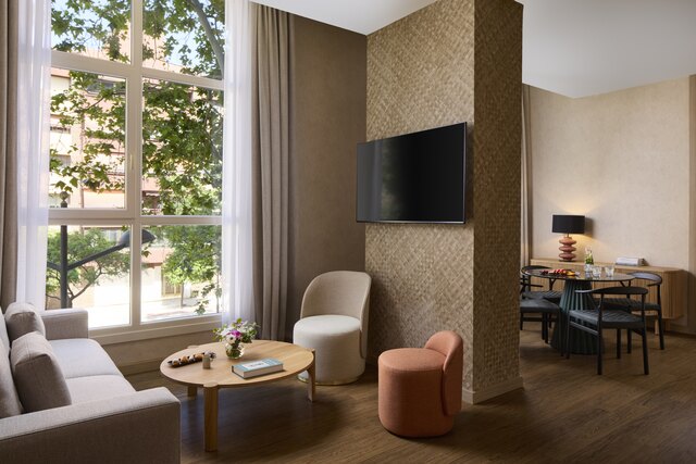 NH_Valencia_Center_Detail_Room_Suite_Living_Room_Window_Natural_Light.jpg