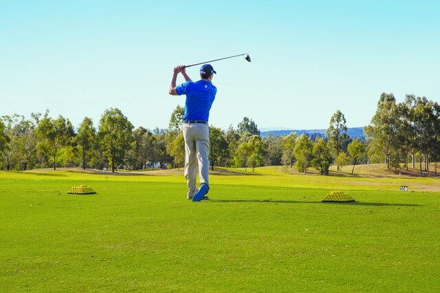 Oaks_Cypress_Lakes_Resort_Property_Amenity_Golf_Course_Golfer.jpg