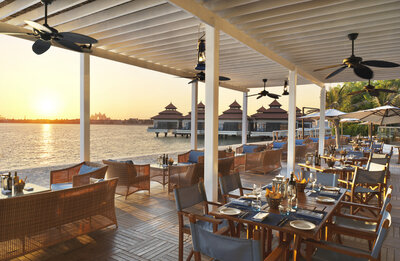 Anantara_The_Palm_Dubai_Resort_The_Beach_House_terrace_sunset-2500x1629