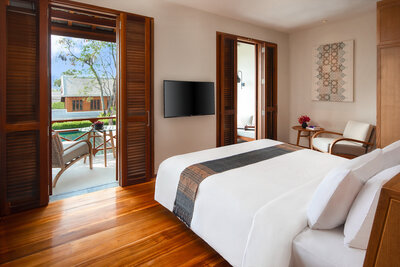 Avani_Plus_Luang_Prabang_Hotel_Guest_Room_Avani_Deluxe_Pool_View_Room_Balcony_View_From_King_Bed-6016x4016