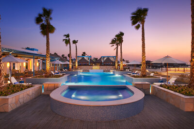 Banana_Island_Resort_Doha_by_Anantara_Recreational_facility_Pool_Sunset