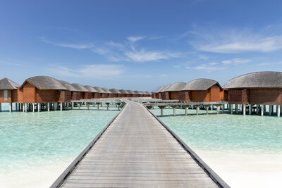 Anantara_Dhigu_Maldives_Resort_Guest_Room_Walkway_to_the_Over_Water_Suites