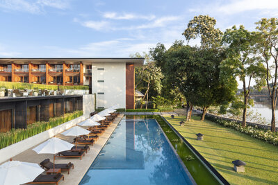 Anantara_Chiang_Mai_Resort_Swimming_Pool_River_Spa_View