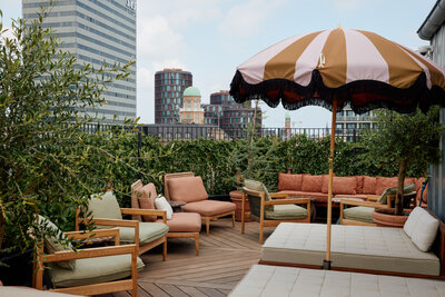 NH_Collection_Copenhagen_Grand_Joanne_terrace_sitting_area_city_view.jpg