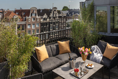 Anantara_Grand_Hotel_Krasnapolsky_Amsterdam_room_Presidental_Suite_Terrace_champagne