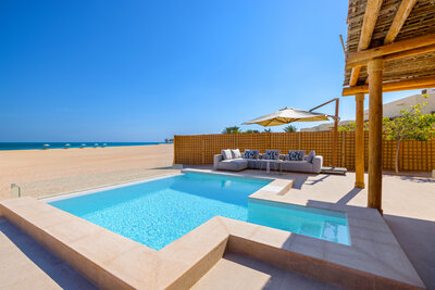 Anantara_Sir_Bani_Yas_Island_Al_Yamm_Villa_Resort_Guest_Room_One_Bedroom_Anantara_Pool_Villa_Exterior_Beach_View_with_Pool_2-8192x5464