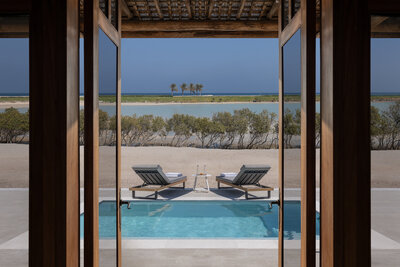 Anantara_Sir_Bani_Yas_Island_Al_Yamm_Villa_Resort_Guest_Room_Deluxe_Pool_ Villa_Exterior_Pool_Deck_Lagoon_View-8458x5647