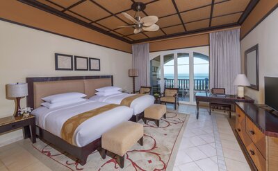 Desert_Islands_Resort_and_Spa_by_Anantara_Guest_Room_Deluxe_Sea_View_Twin_Bedroom