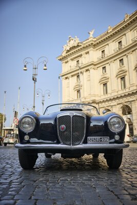 Lancia Aurelia B24 Convertible with Anantara Palazzo Naiadi Roma backdrop.jpg