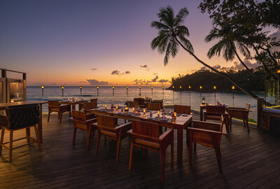 Avani_Barbarons_Seychelles_Resort_Property_Amenity_Restaurant_The_Terrace_Family_Table_Sunset