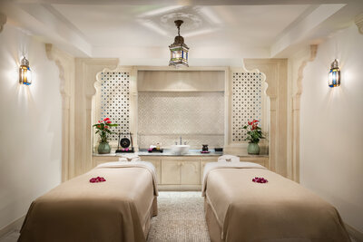 Anantara_Siam_Bangkok_Hotel_Spa_Treatment_Room_Beds_Floral_Decorations