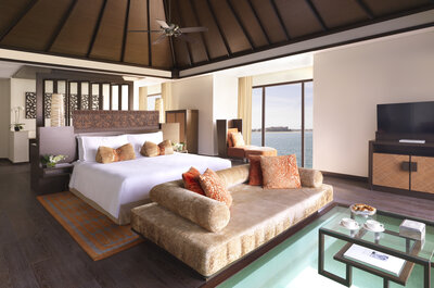 Anantara_The_Palm_Dubai_Resort_Guest_Room_One_Bedroom_Over_Water_Villa_Bedroom_and_Lounge-8272x5472