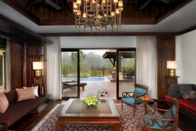 Anantara_Xishuangbanna_Resort_Guest_Room_Living_Room_With_Pool_View-5283x3522