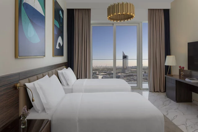 Avani_Plus_Palm_View_Dubai_Hotel_and_Suites_Guest_Room_Studio_Bedroom_Twin_Beds