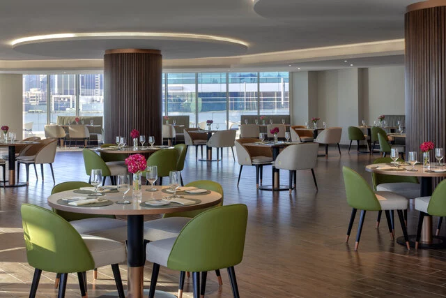 Avani_Palm_View_Dubai_Hotel_and_Suites_Restaurant_Seven_Seeds_All_Day_Dining_Interior_Table_Arrangement