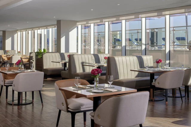 Avani_Palm_View_Dubai_Hotel_and_Suites_ Restaurant_Seven_Seeds_Interior_with_Window_View