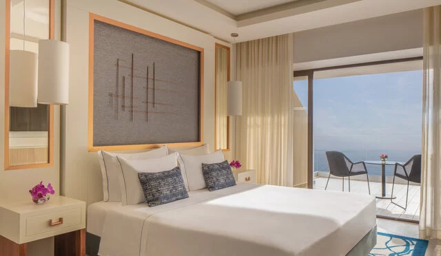 Tivoli_Carvoeiro_Algarve_Resort_Guest_Room_Deluxe_Room_Sea_View_Bedroom_Terrace_View-8085x4699