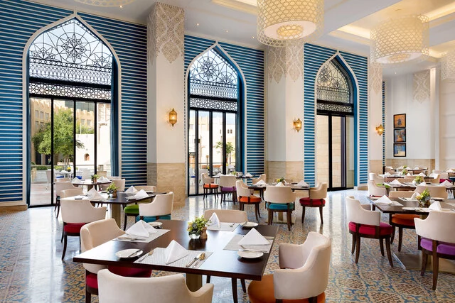 Al_Najada_Doha_Hotel_By_Tivoli_Restaurant_Al_Baraha_Restaurant_Interior_Table_Setup