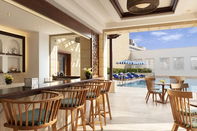 Al_Najada_Doha_Hotel_By_Tivoli_Pool_View_Pool_Bar_and_Seating_Area