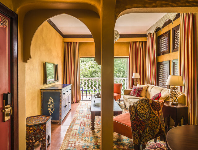 Avani_Victoria_Falls_Resort_Guest_Room_Avani_Suite_Living_Room_and_Partial_View_of_Dining_Area.jpg