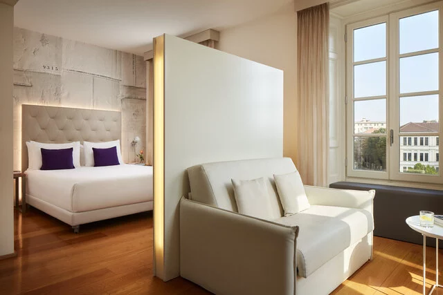 Avani_Palazzo_Moscova_Milan_Hotel_Junior_Suite_Sofa_Curtains_Open_Day_Light