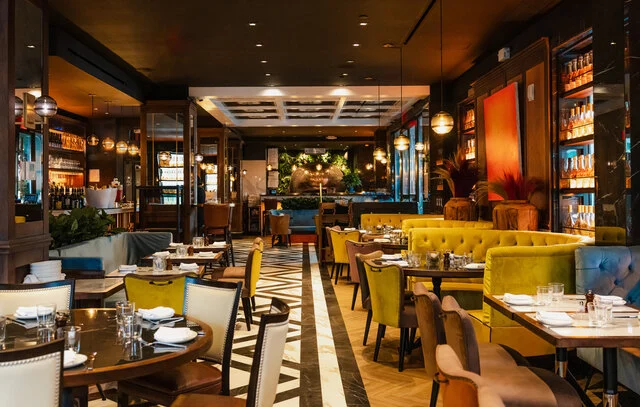 NH_Collection_Madison_Avenue_Restaurant_Serafina_Horizontal_Shoot_Lights_On_Tables_Chairs_Sofa_Cutlery