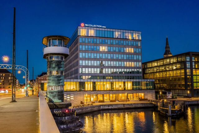 NH_Collection_Copenhagen_Facade_Evening_From_With_Bridge-8145x5433