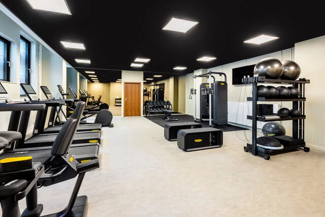 NH_Collection_Copenhagen_Hotel_facilities_gym_interior_run_machines_balls-8192x5464