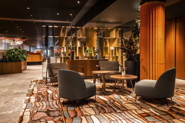 NH_Collection_Copenhagen_Lobby_and_reception_comfy_sitting_with_four_comfortable_chairs-8164x5445