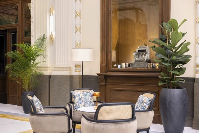 NH_Collection_Prague_Carlo_IV_Lobby_and_reception_detail_sitting_setup_table_lamp_cashing_machine_2-8166x5447