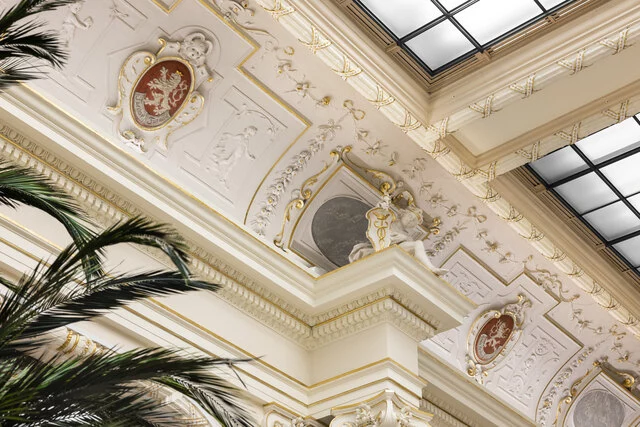 NH_Collection_Prague_Carlo_IV_Lobby_and_reception_detail_ceiling_shield_statue-8166x5447